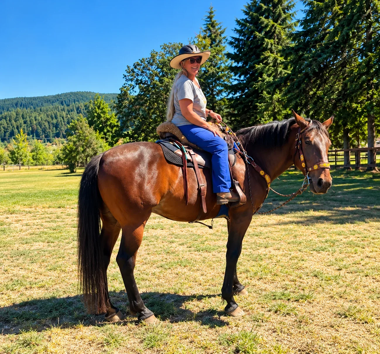 Dani riding a horse outdoors